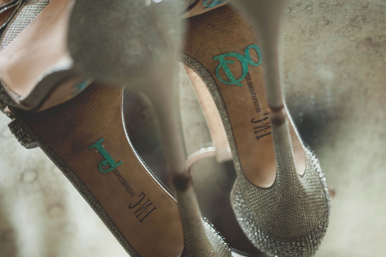 Detail shots of elegant bridal heels with turquoise accents.