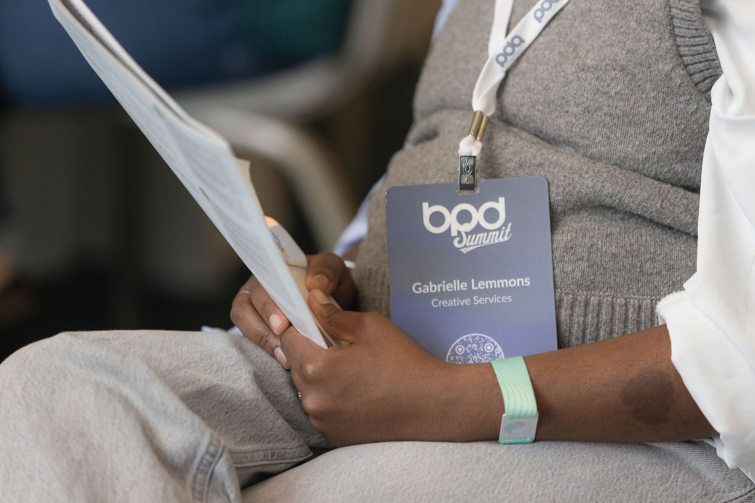 Conference attendees network and engage in conversations at a professional business event.