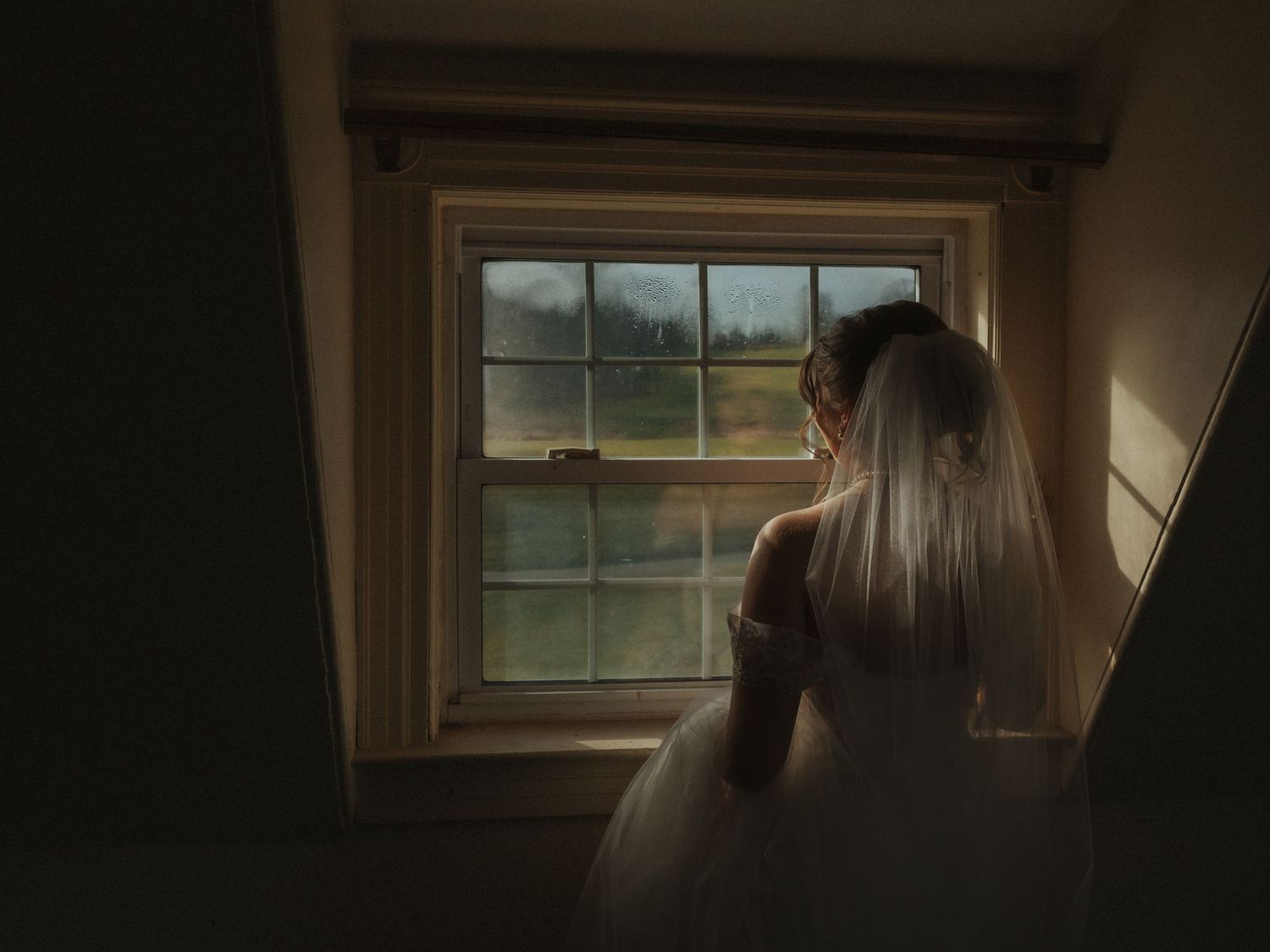 A series of dark interior shots showing a window frame from different angles in low light conditions.