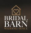 Gold logo for Bridal Barn Wedding Venue featuring a house outline with a heart, on a dark background.