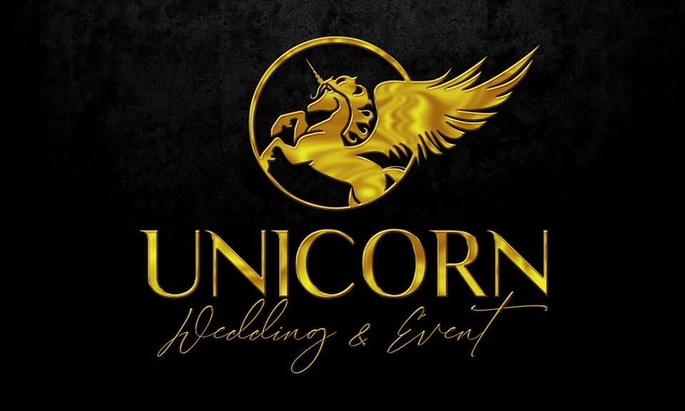 Gold unicorn logo design with wings for wedding and event planning business against black background.
