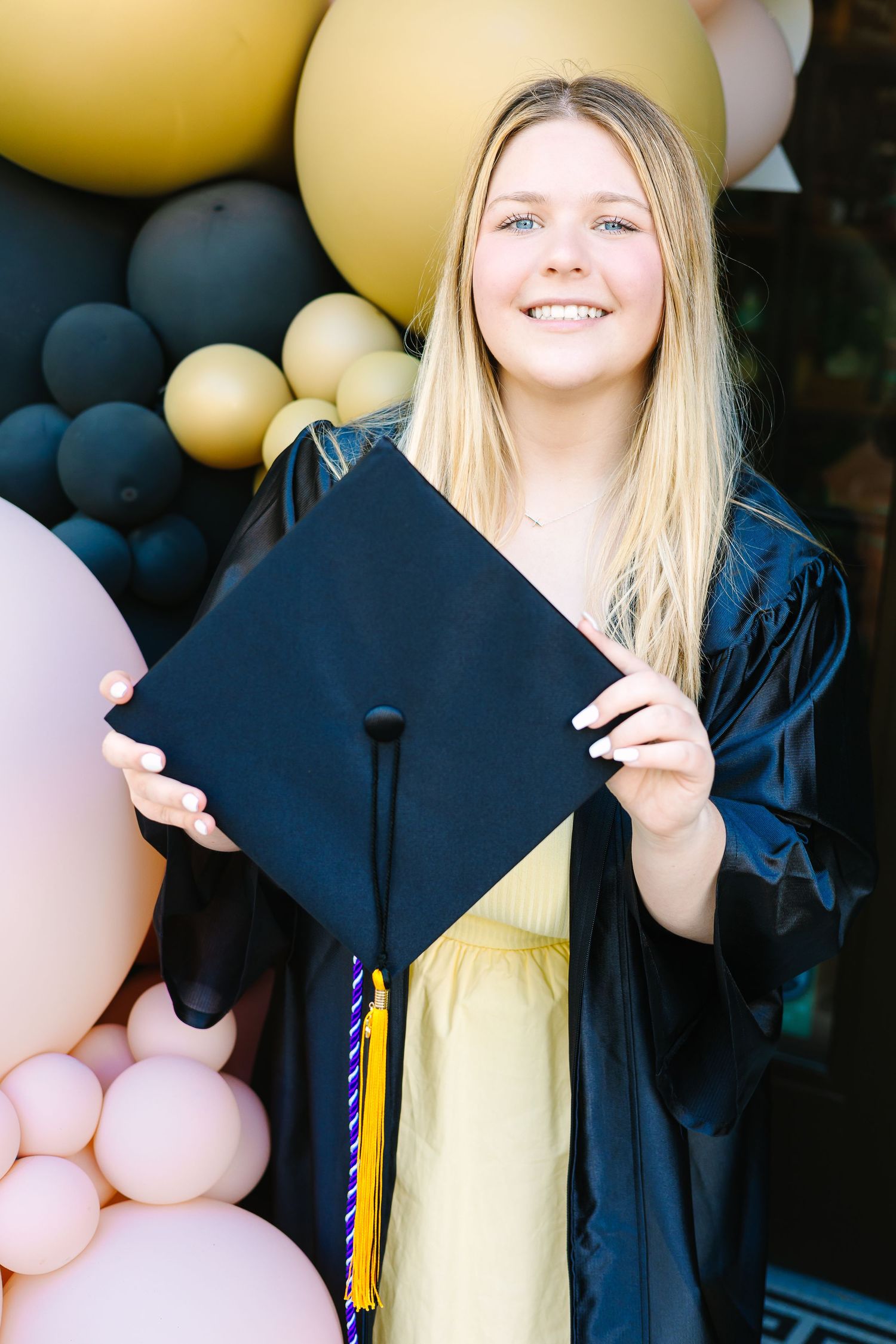 A graduation photo sequence showing someone in a yellow dress holding up a black graduation cap and tassel.