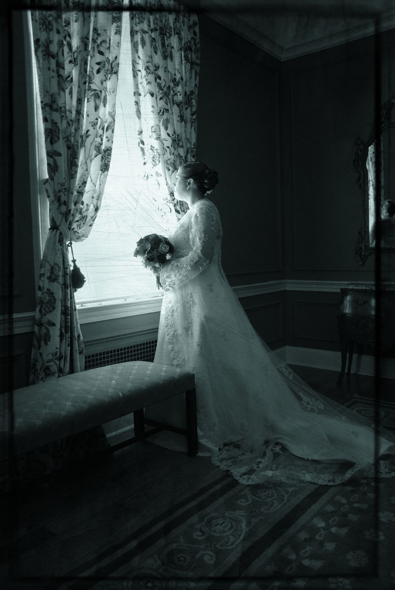 a bride staring out a window