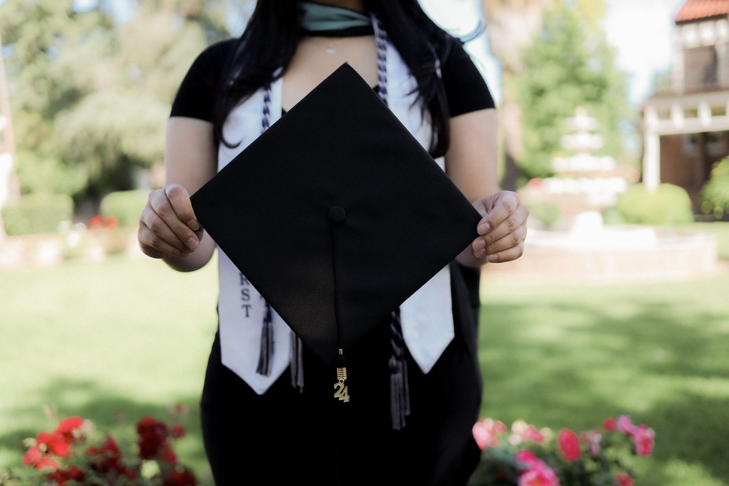 A series of graduation photos showing black academic gowns and caps against outdoor backgrounds with flowers.
