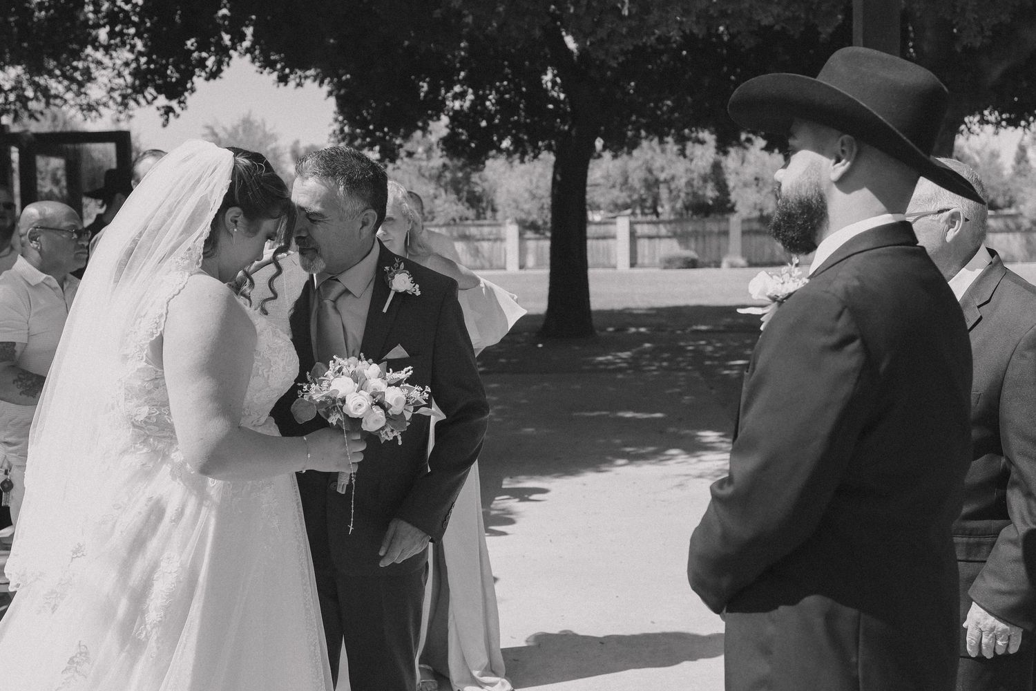 Black and white wedding photos capturing intimate moments between the couple.