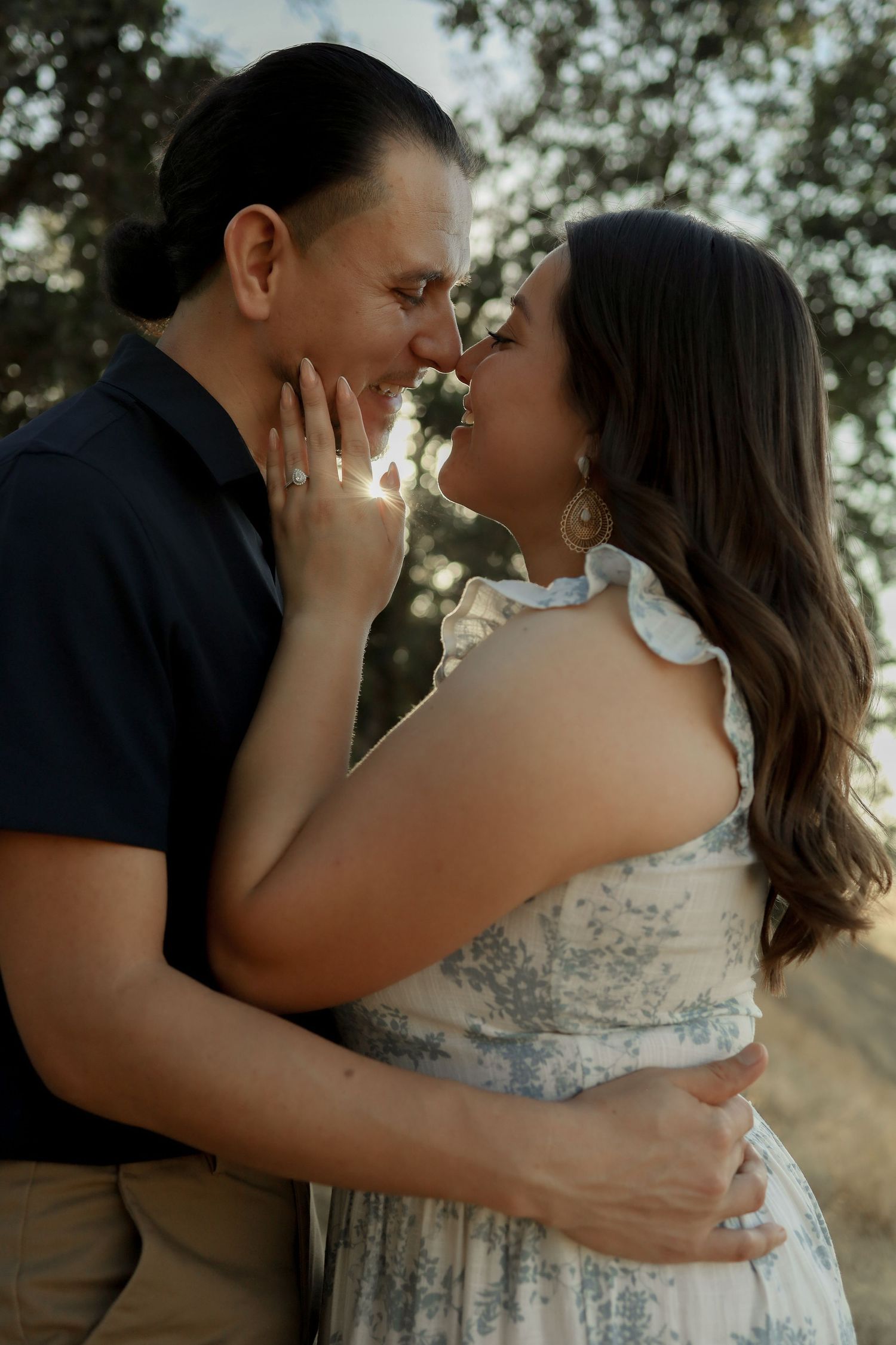 Intimate outdoor portrait sequence showing tender moments between two people.