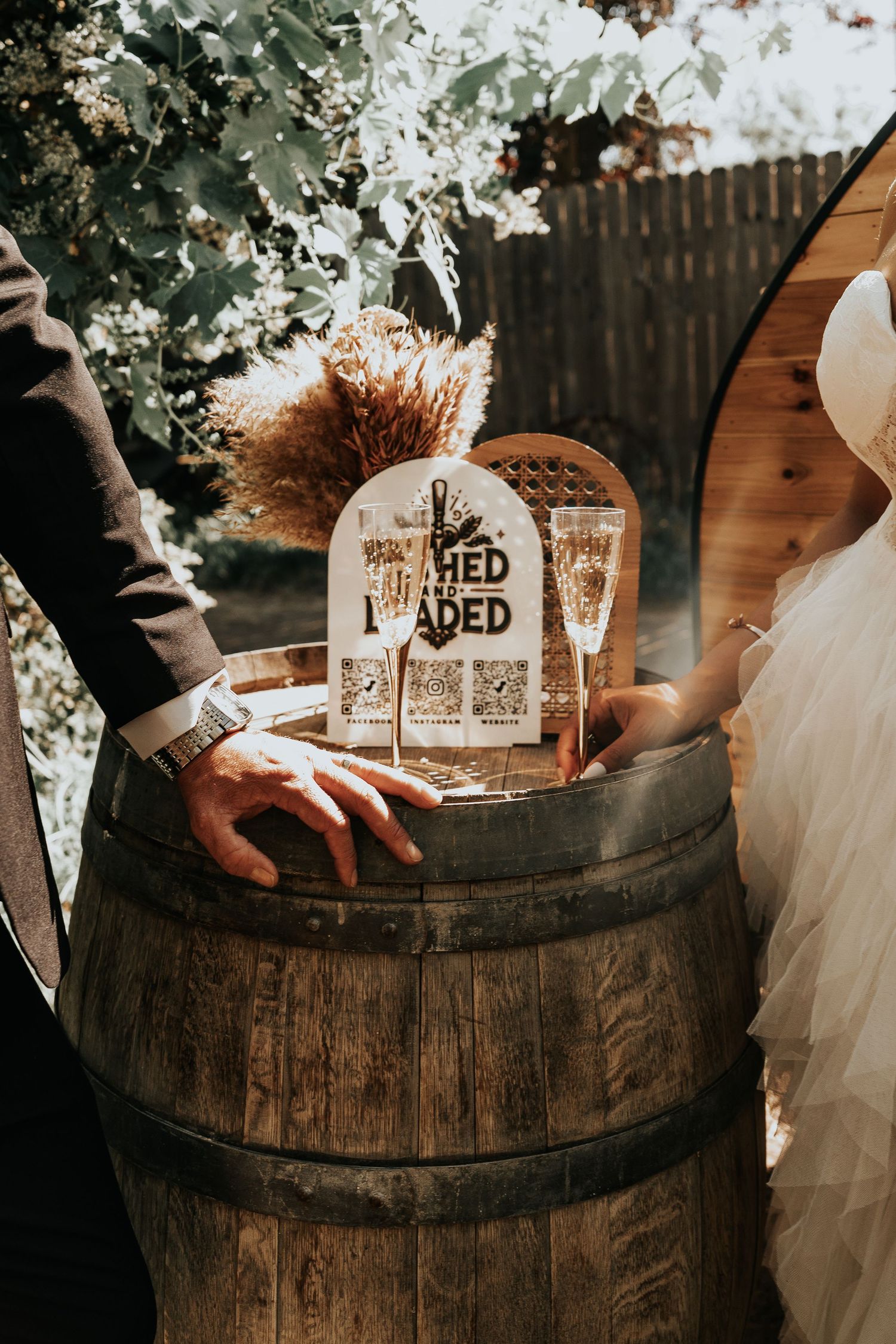 Artistic detail shots of wedding decorations arranged on a vintage wooden barrel.