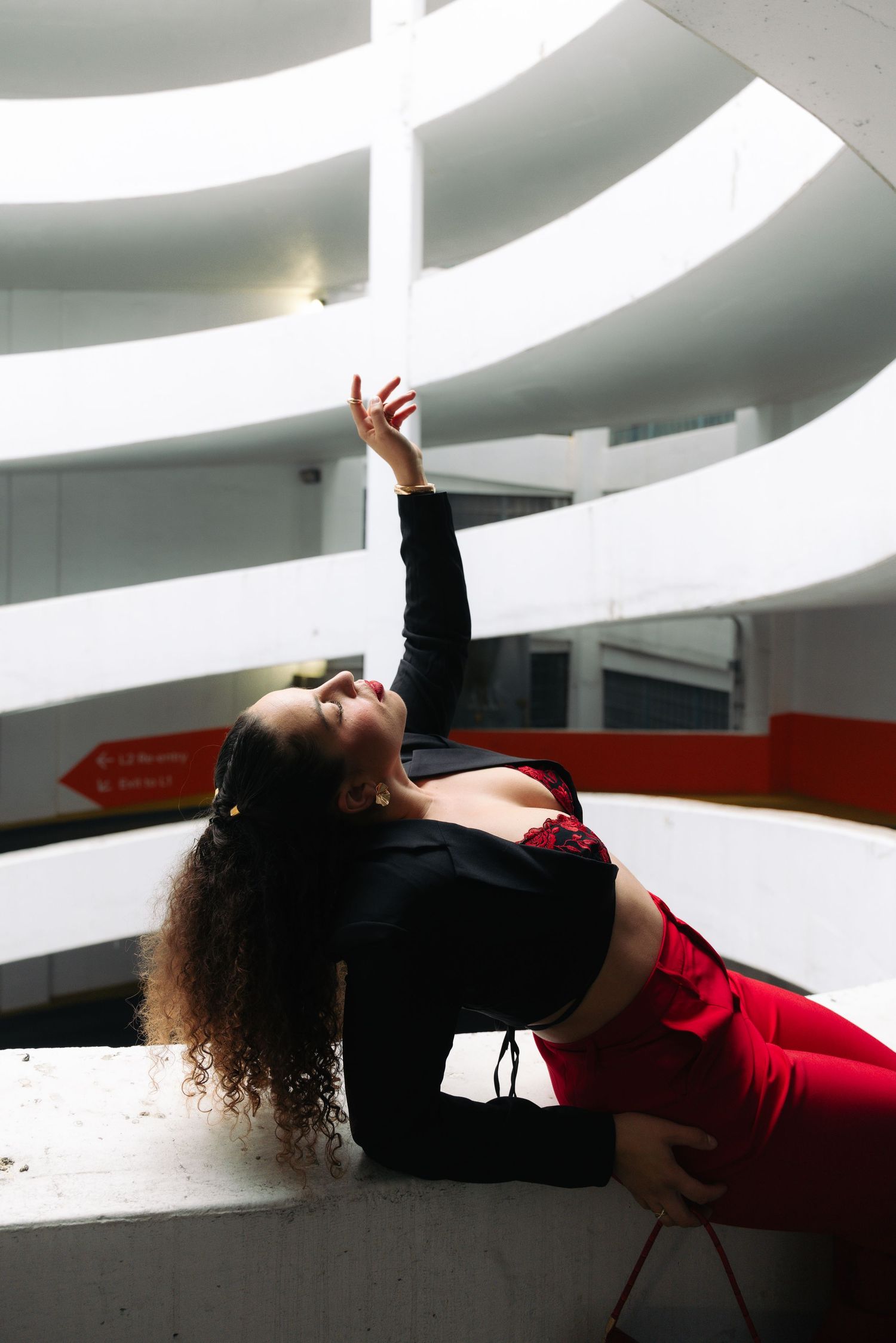 model posing in car parkade in edmonton