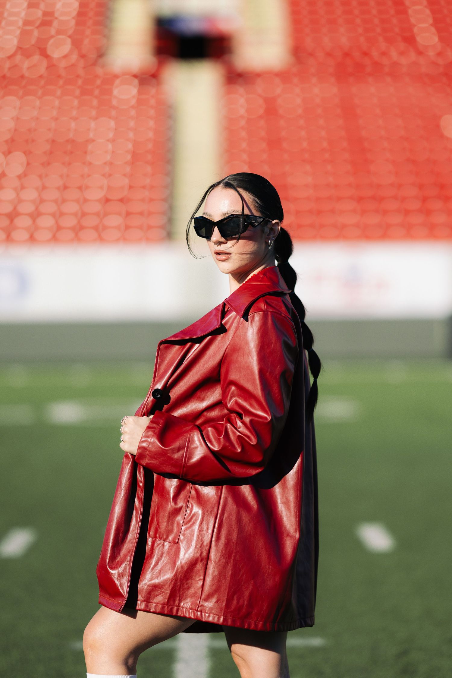 calgary model in football field in editorial outfit