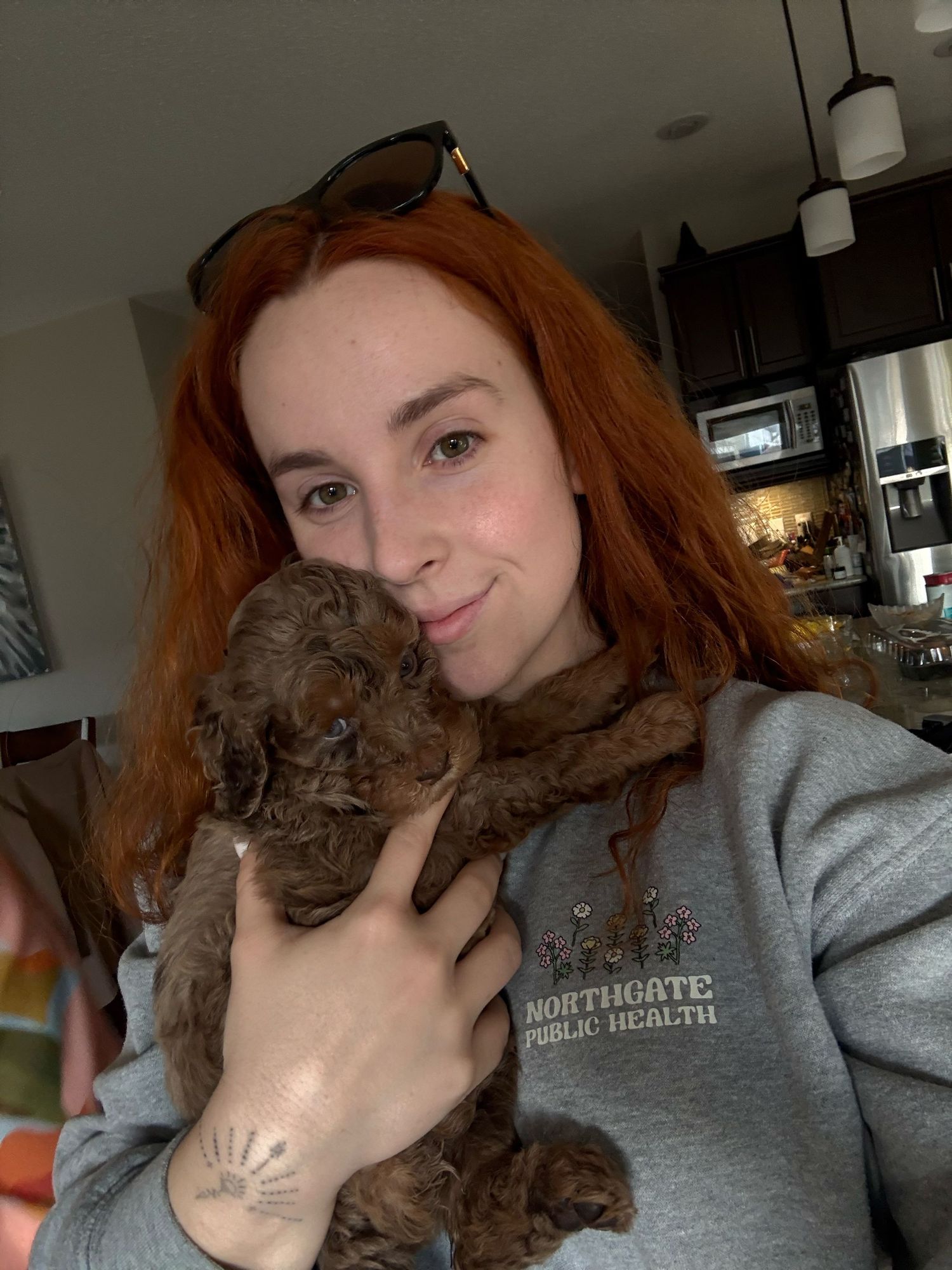 selfie with woman and golden doodle
