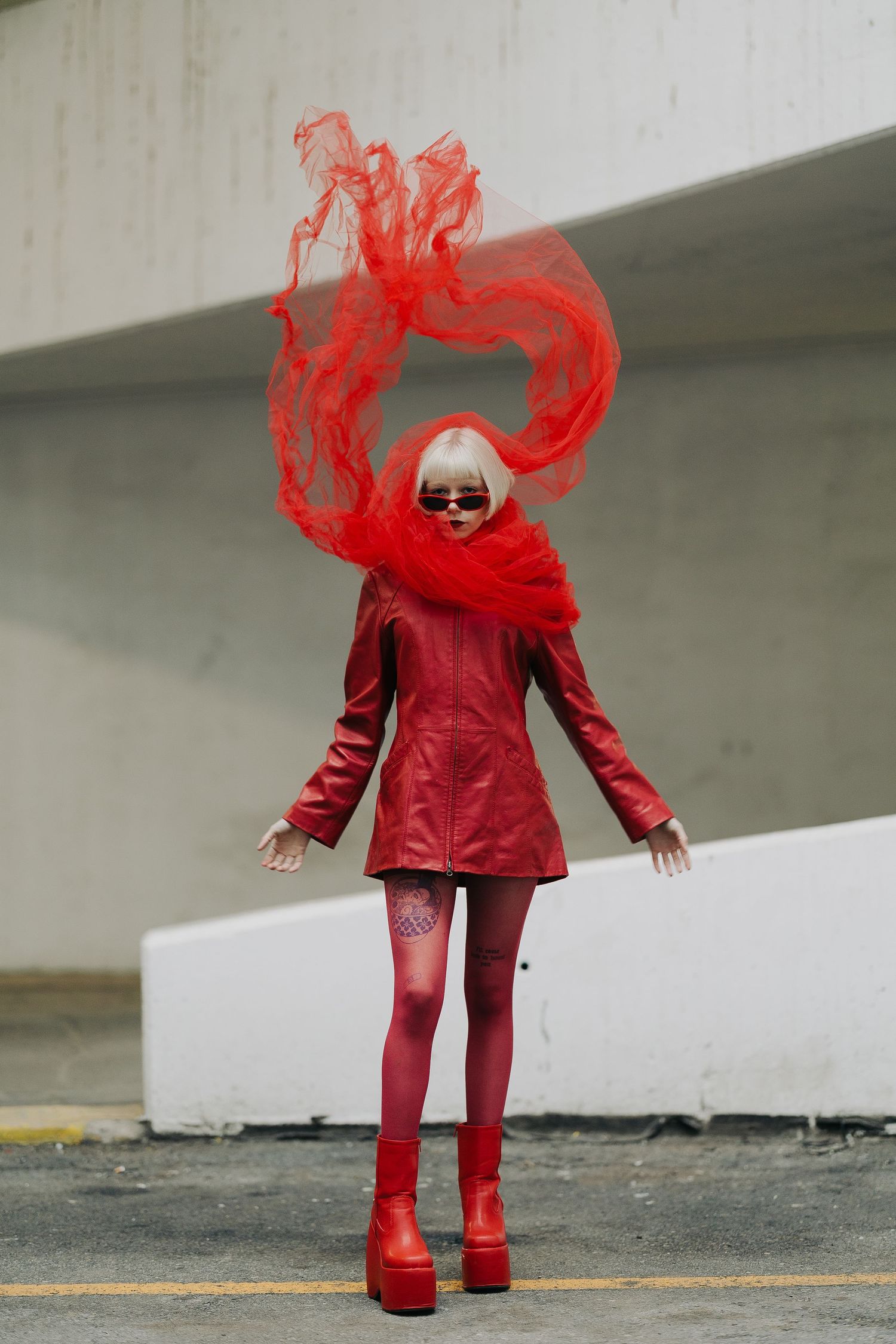 edmonton stairwell capturing editorial model in red captured by Marcu Fotography