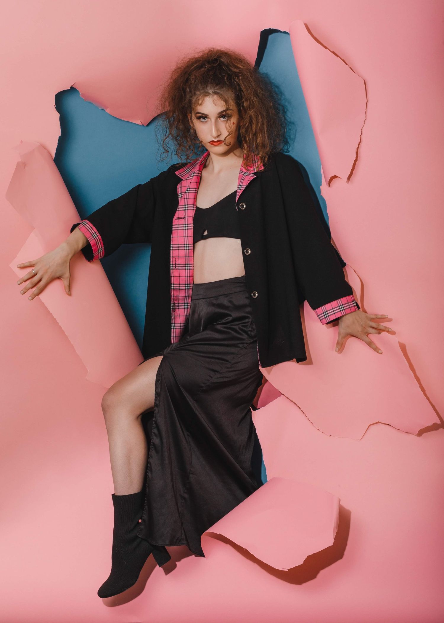 studio editorial photoshoot coming through paper