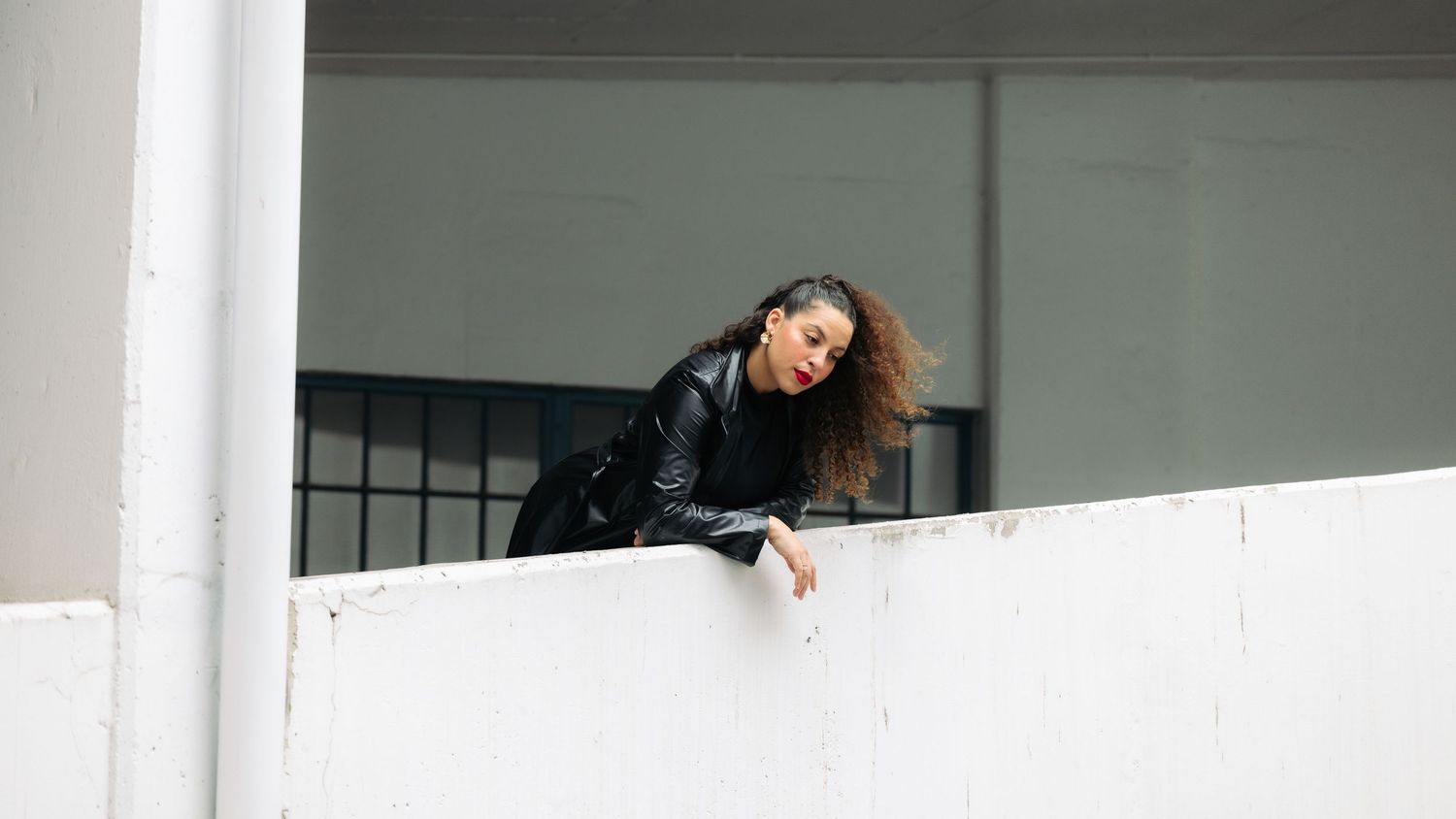 model posing in car parkade in edmonton