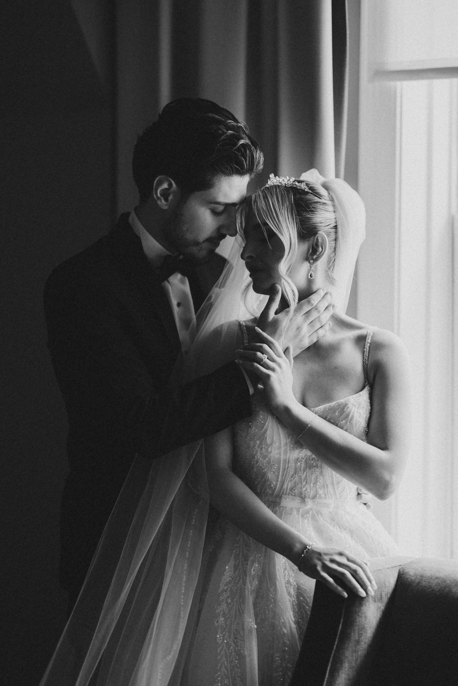 moody black and white image capturing arabic wedding couple at the fairmont captured by Marcu Fotography