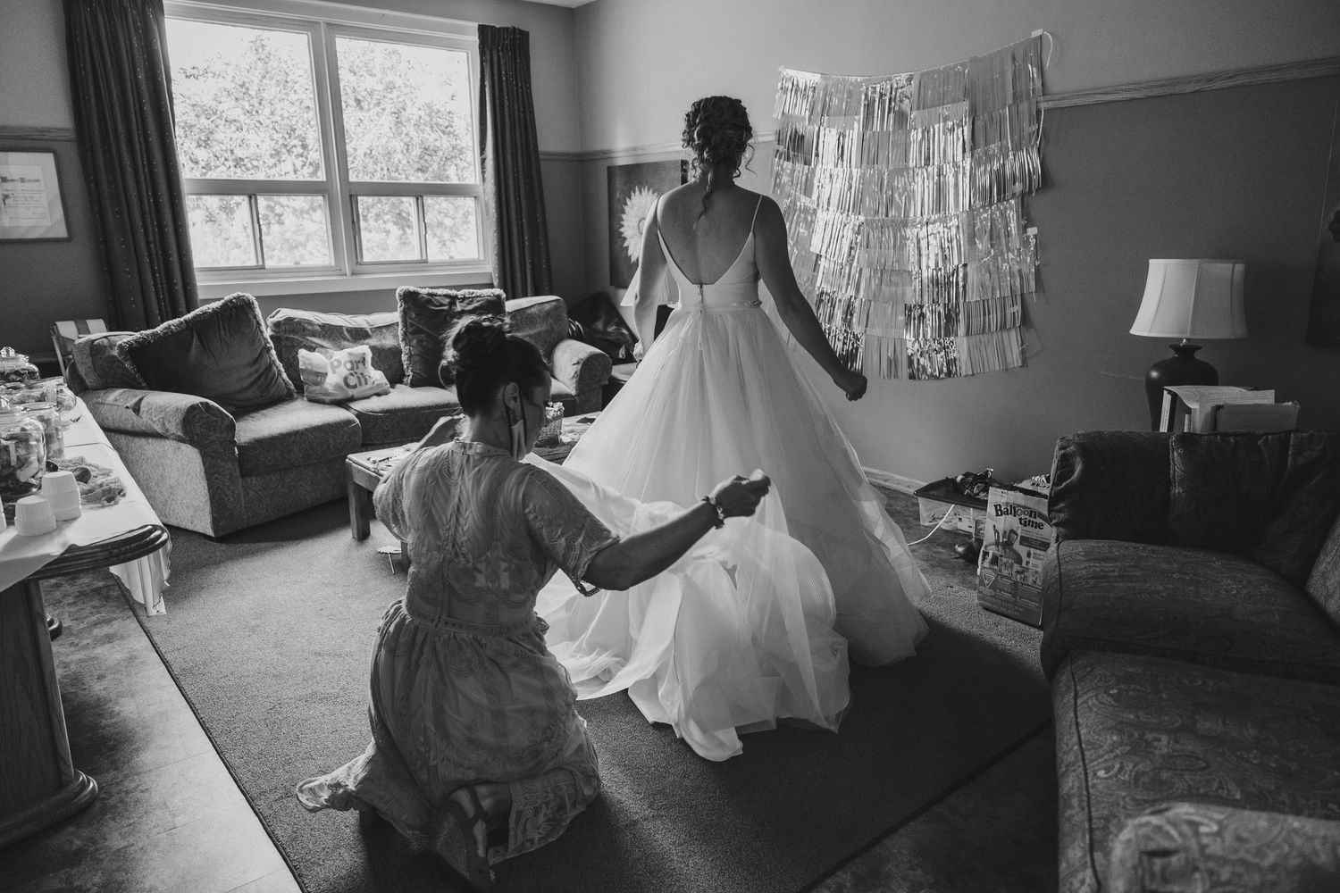wedding dress getting pinned up