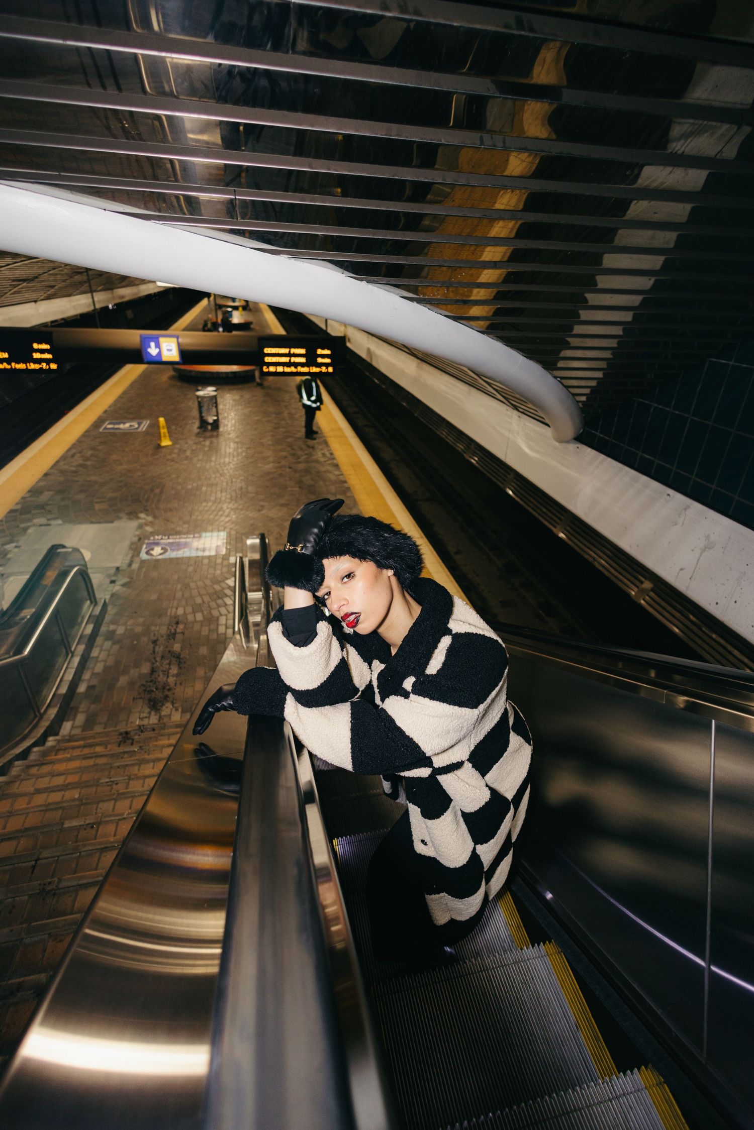 model posing in LRT station in edmonton
