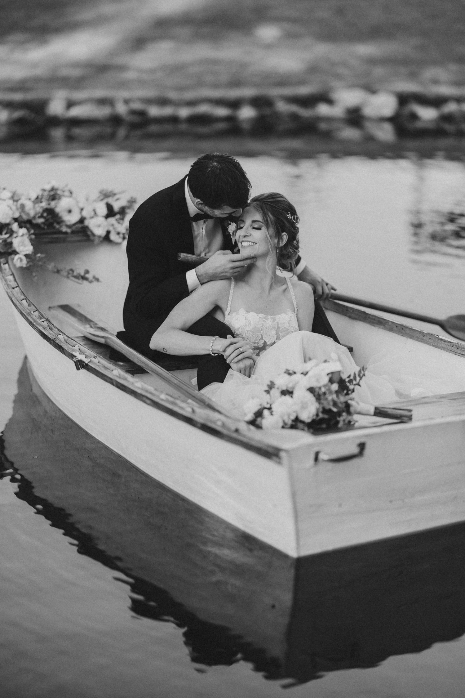 wedding couple captured in boat the pine and pond captured by Marcu fotography