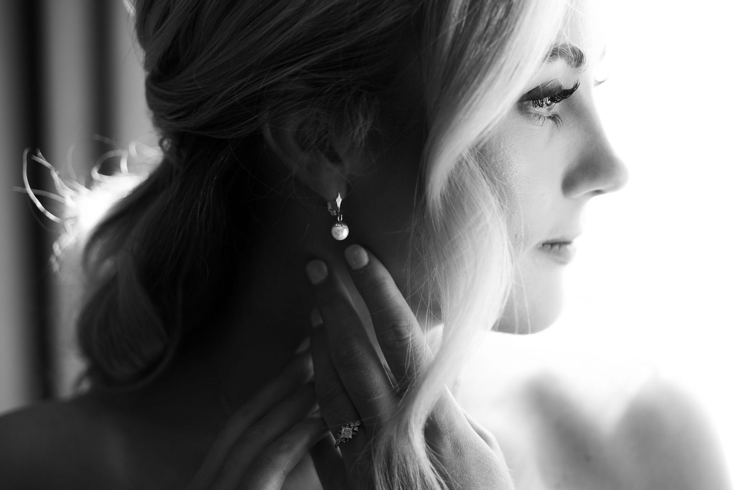 black and white getting ready closeup of bride