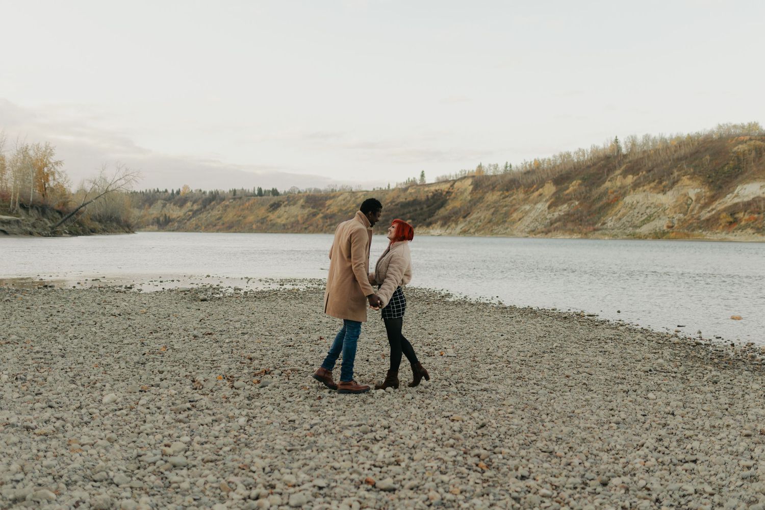fall couple portrait by the river