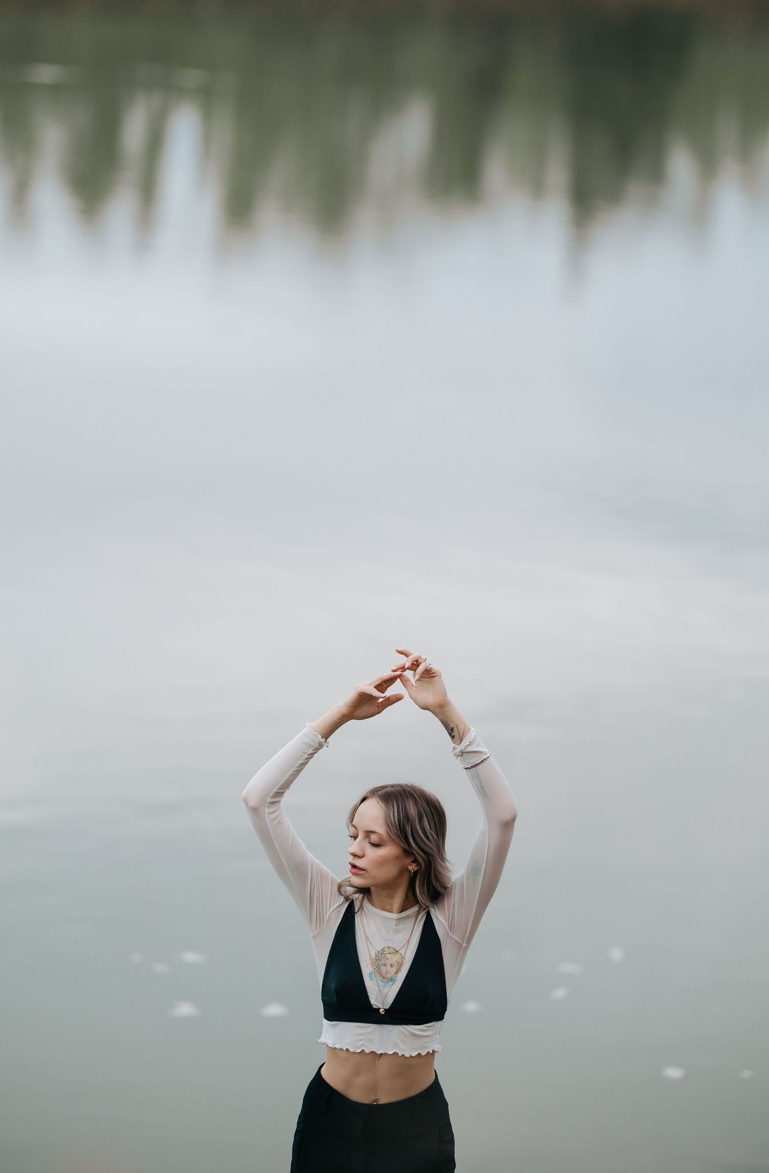 Edmonton model posing by river in Edmonton by Marcu Fotography