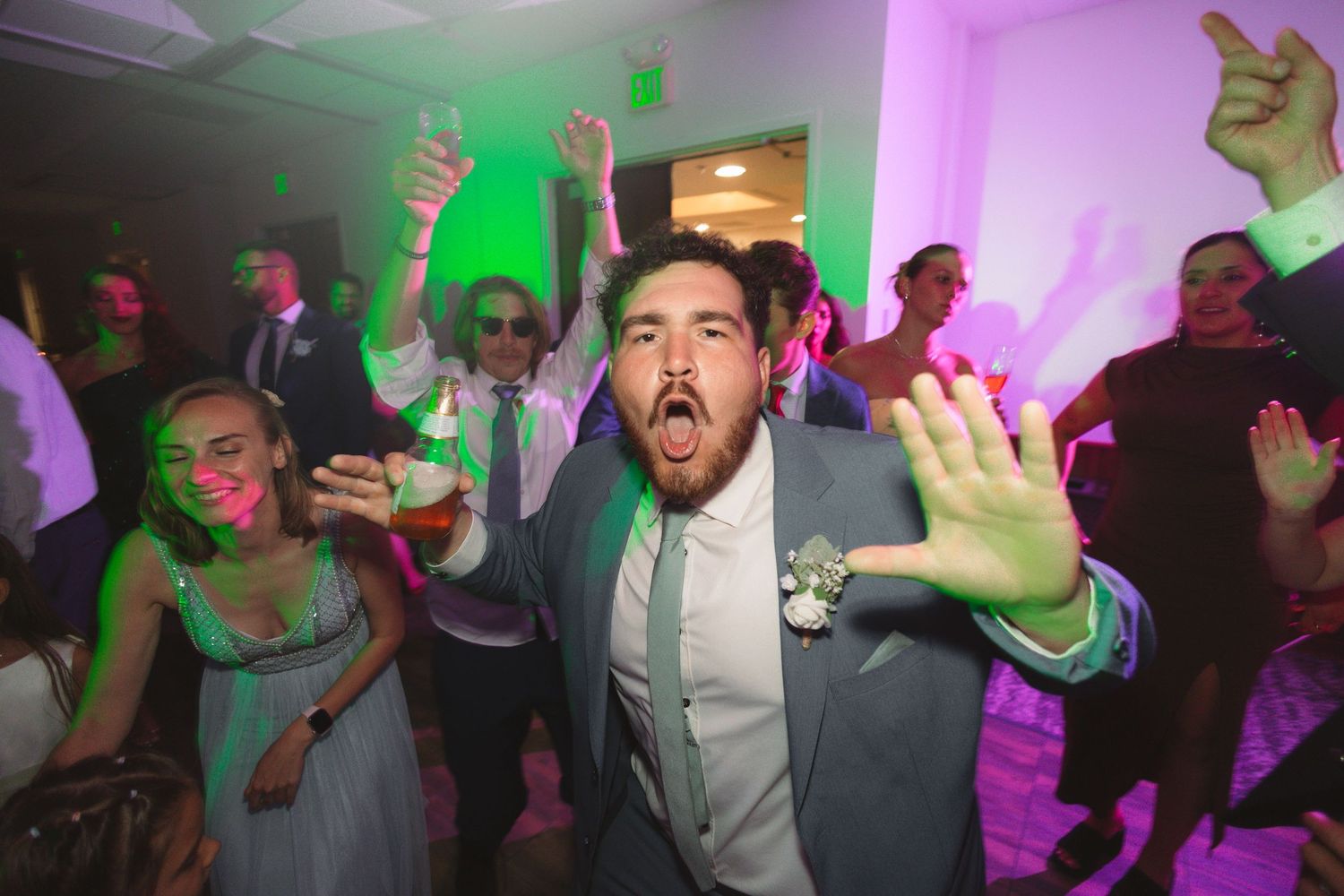 reception flash photography of groomsmen