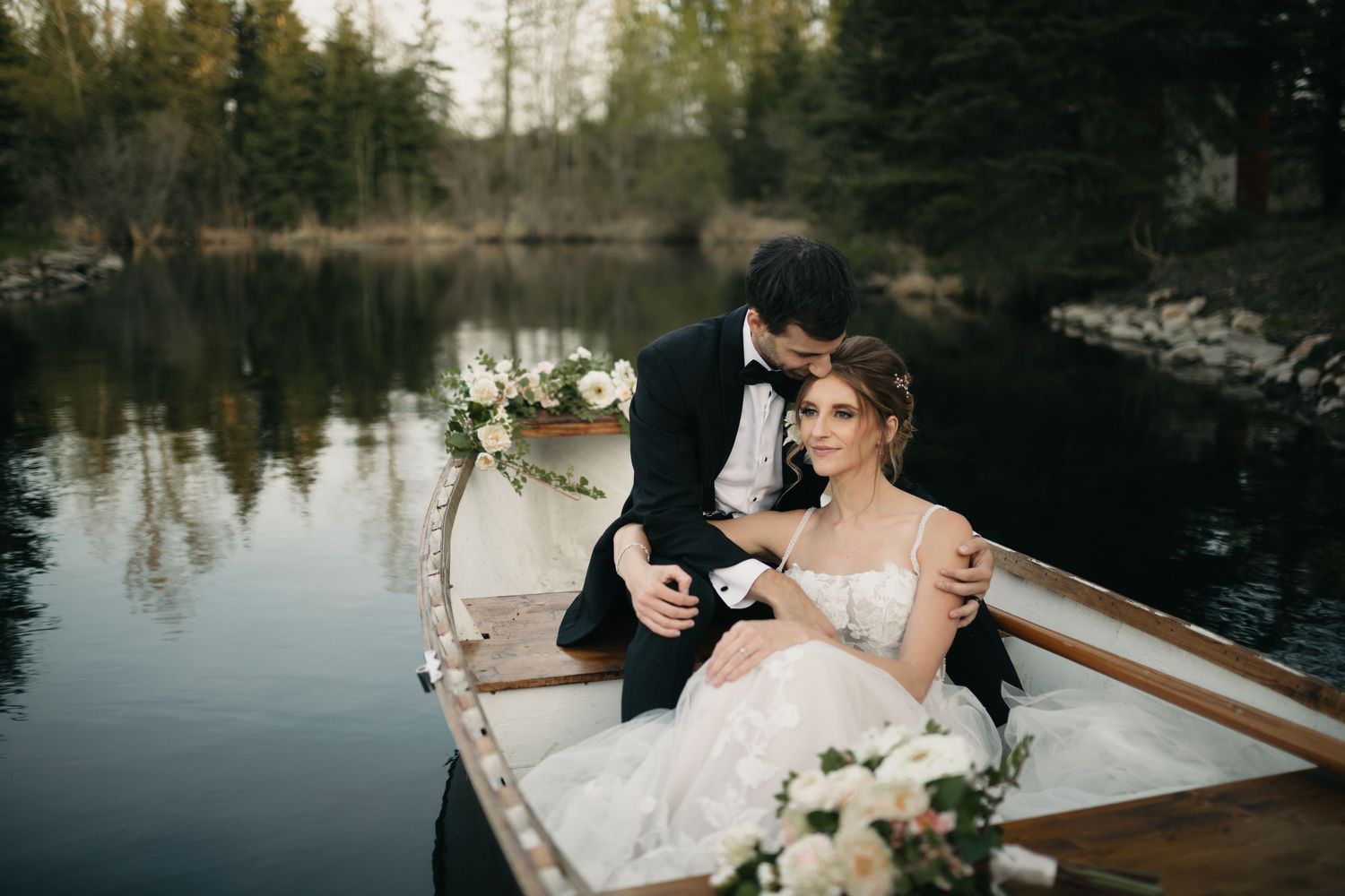 bride and groom in wedding boat