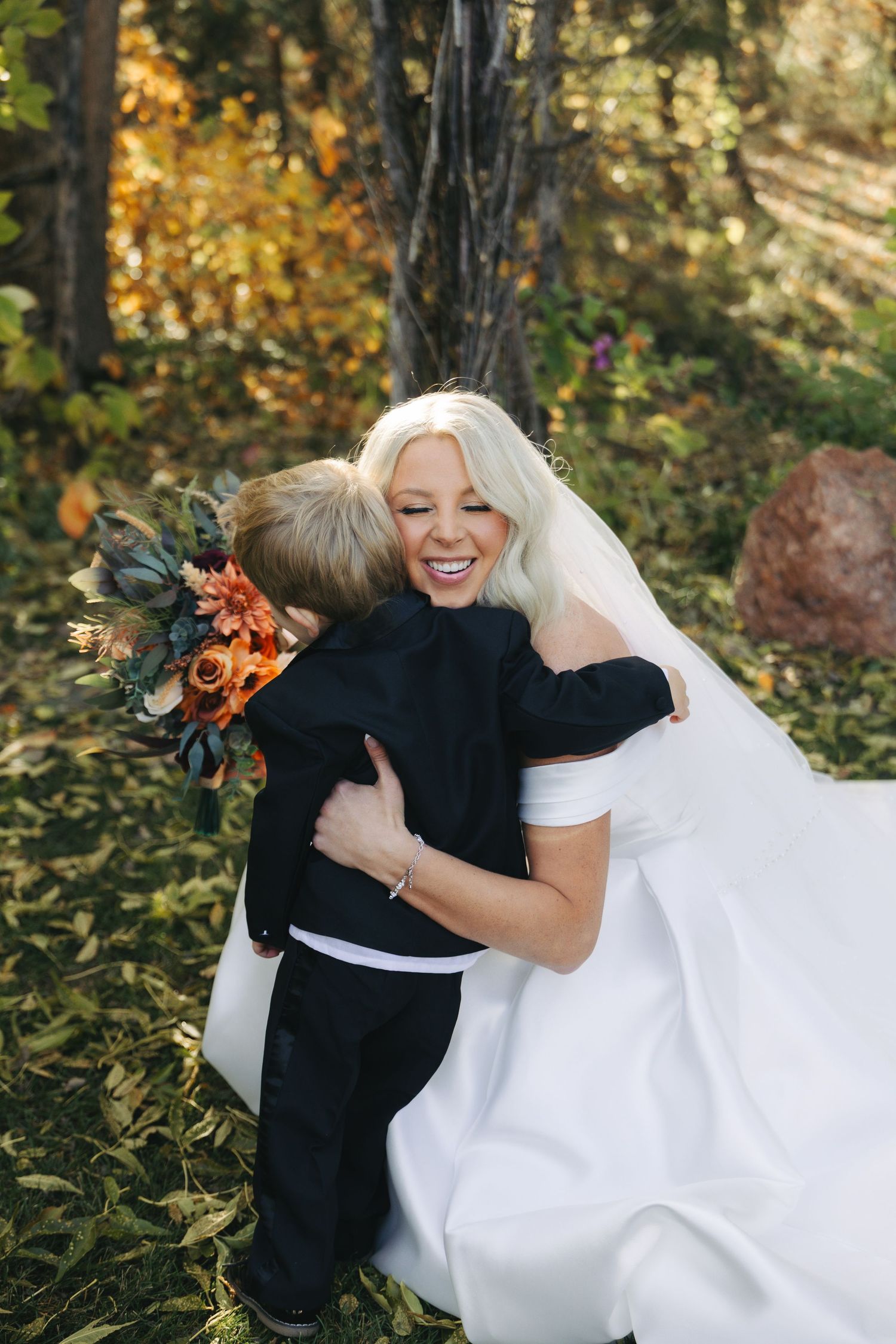 bride hugging child