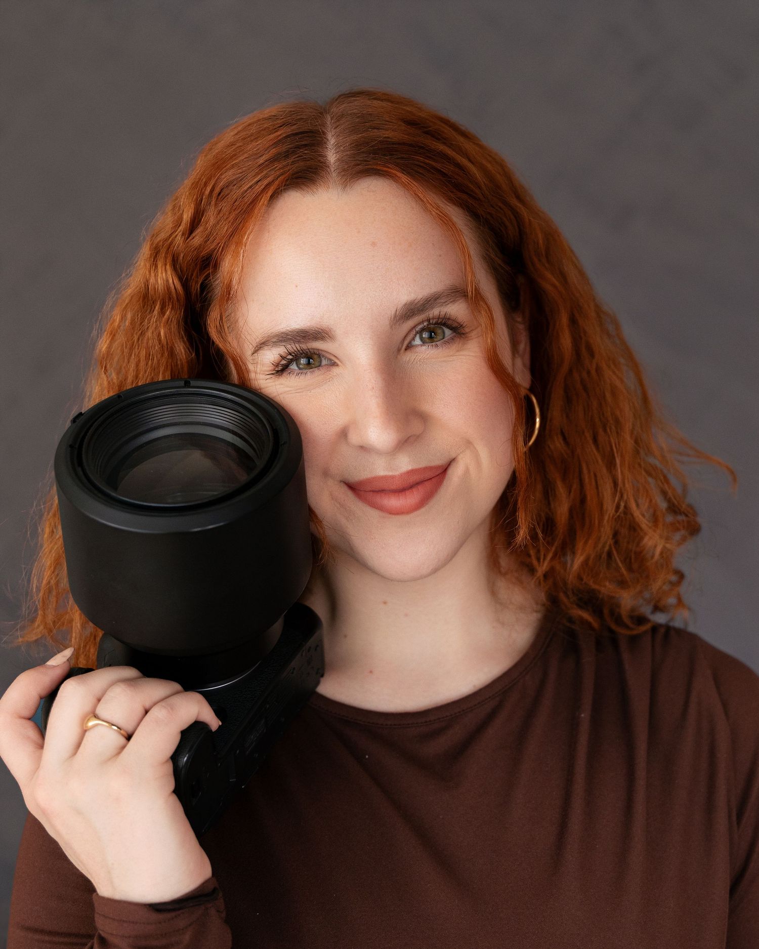 Headshot of Marcu Fotography - best Edmonton wedding photographer who captures destination luxury weddings
