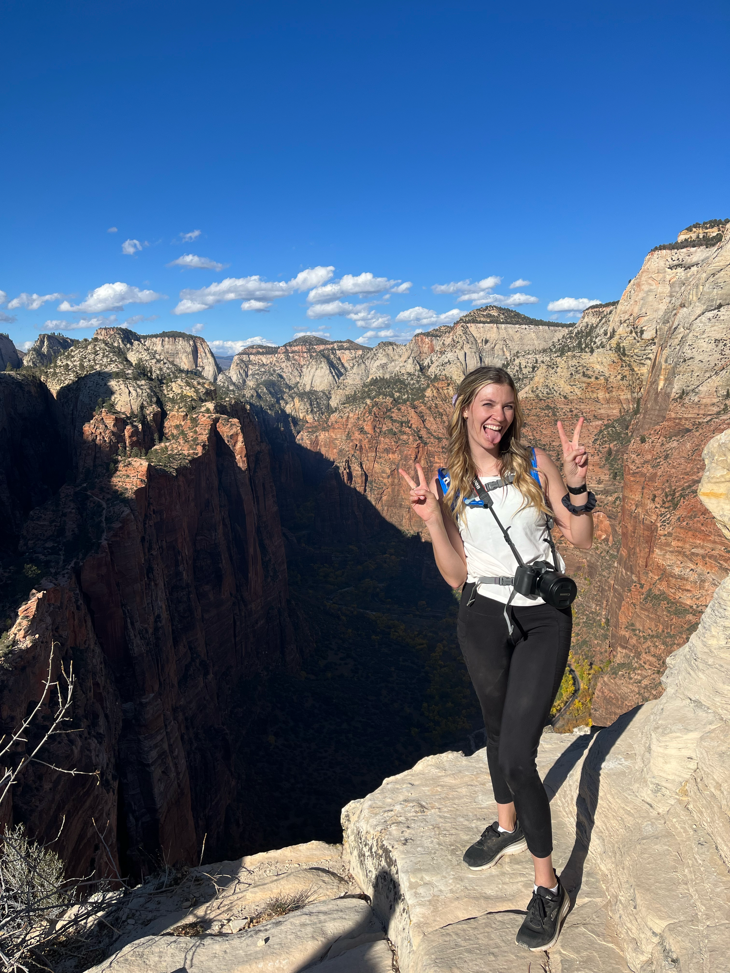 A photographer climbed Angels Landing and took a photo at the top.