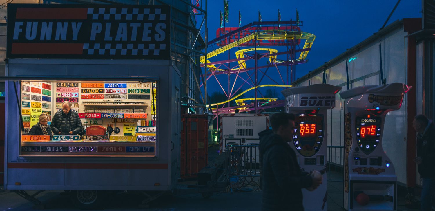 Neon lights and signage of an entertainment venue at night.