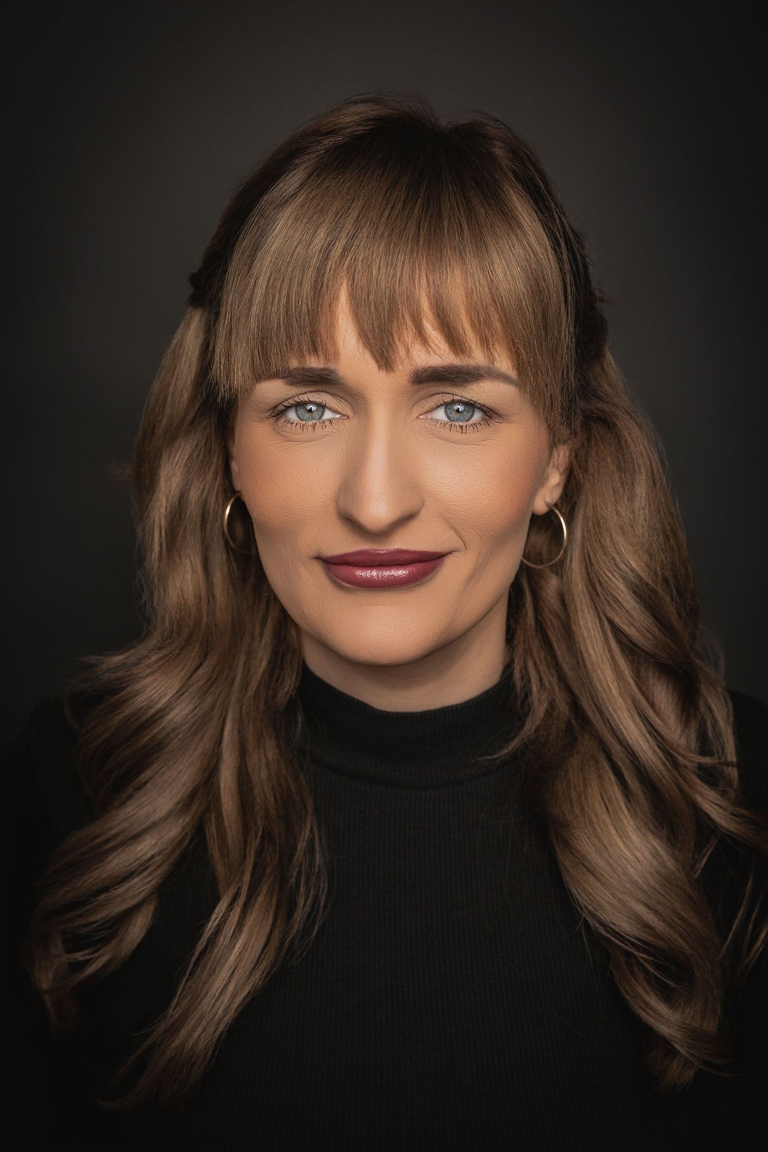 Portrait series showing dark brown hair against black background with dramatic makeup and lighting.