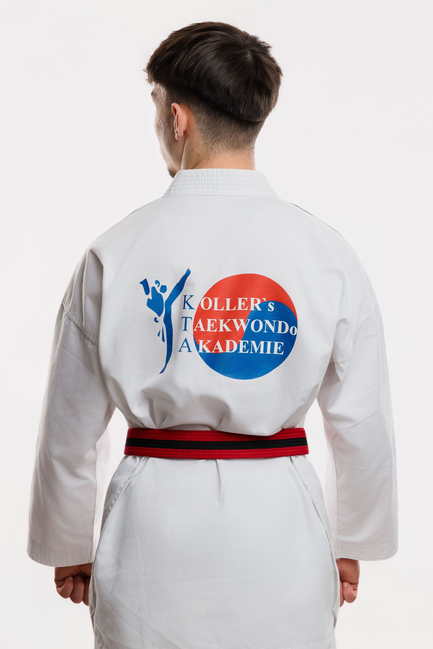Three views of a white taekwondo uniform with red belt and blue academy logo showing front and back details.
