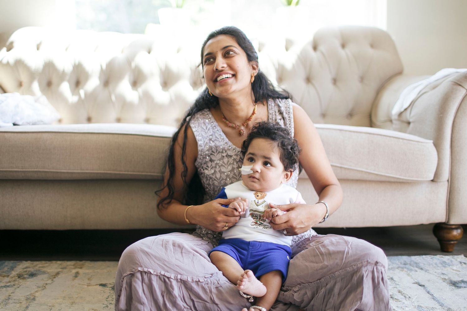 everett family photographer: a candid photo of mother and son at home during their family photo session