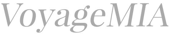 A stylized gray text logo displaying 'VoyageMIA' in an elegant font against a white background.