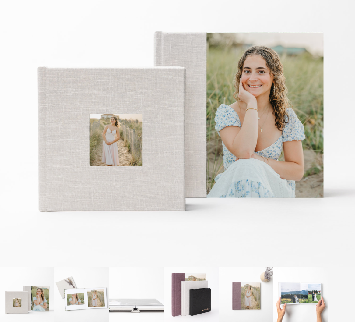 Collection of elegant gray and white photo boxes and keepsake albums displayed in a modern, minimalist style.
