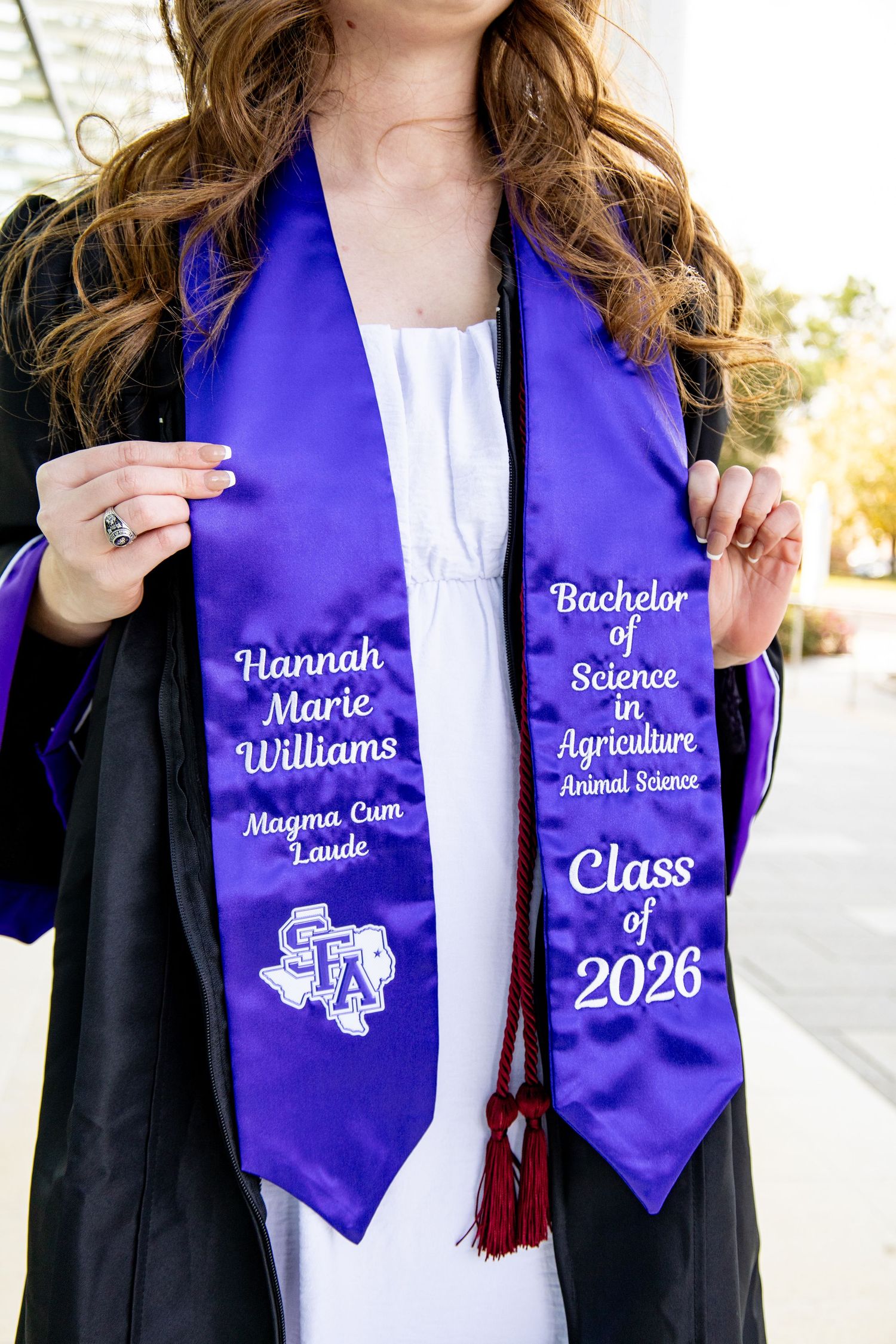 Purple graduation stole for Hannah Marie Williams, Magna Cum Laude, Bachelor of Science in Agriculture Animal Science, Class of 2026.