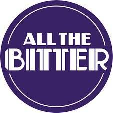 Purple circular logo design featuring the text All The Bitter in white.