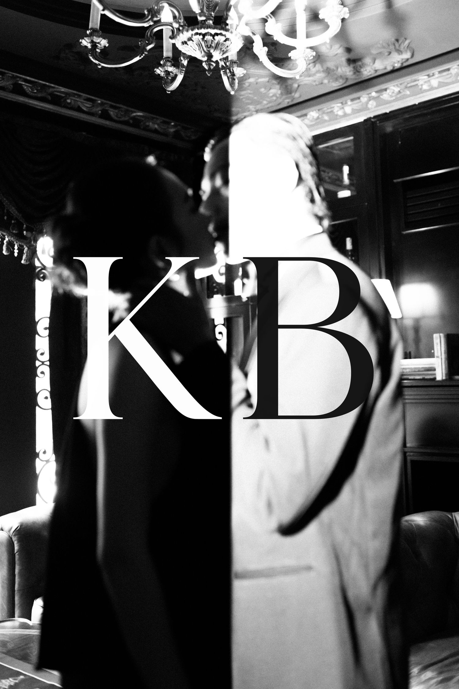 Black and white photo of two silhouettes in an elegant room with chandelier, overlaid with bold KB monogram logo.