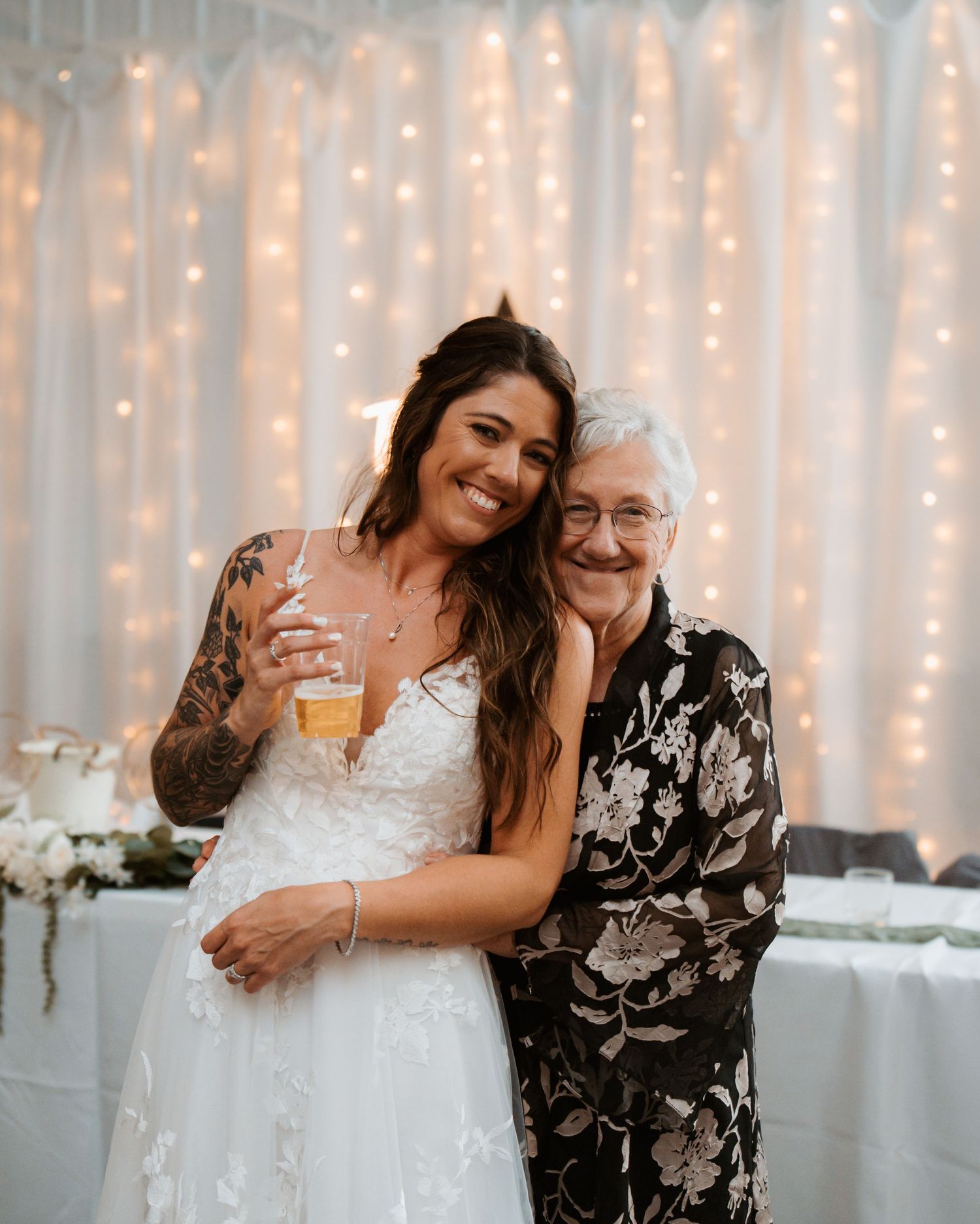 Emotional wedding moments captured against a backdrop of twinkling fairy lights. Delta, Ohio wedding venue
