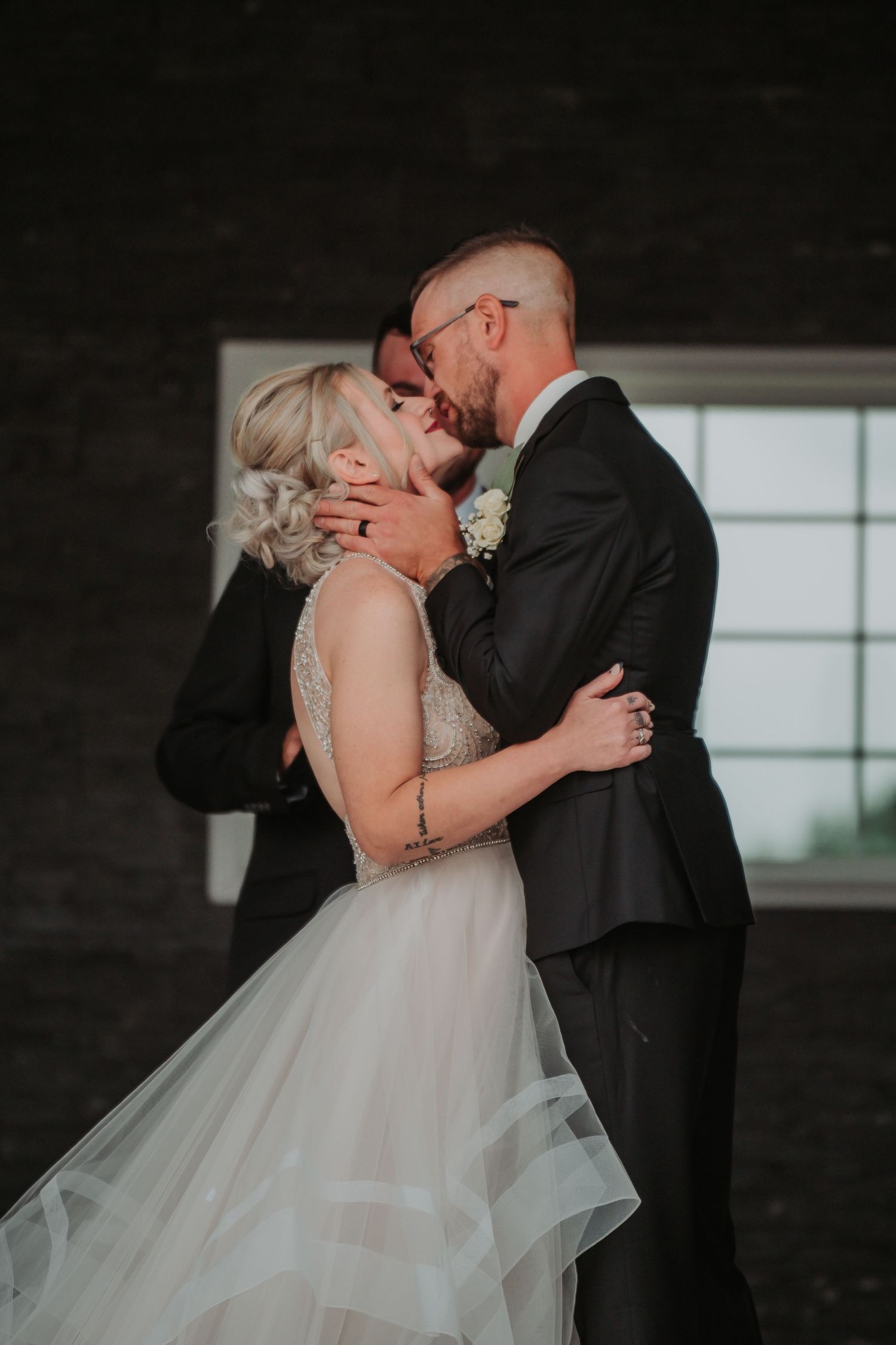 Intimate wedding couple portraits showing tender moments in formal attire. Tiffin, Ohio Wedding Venue