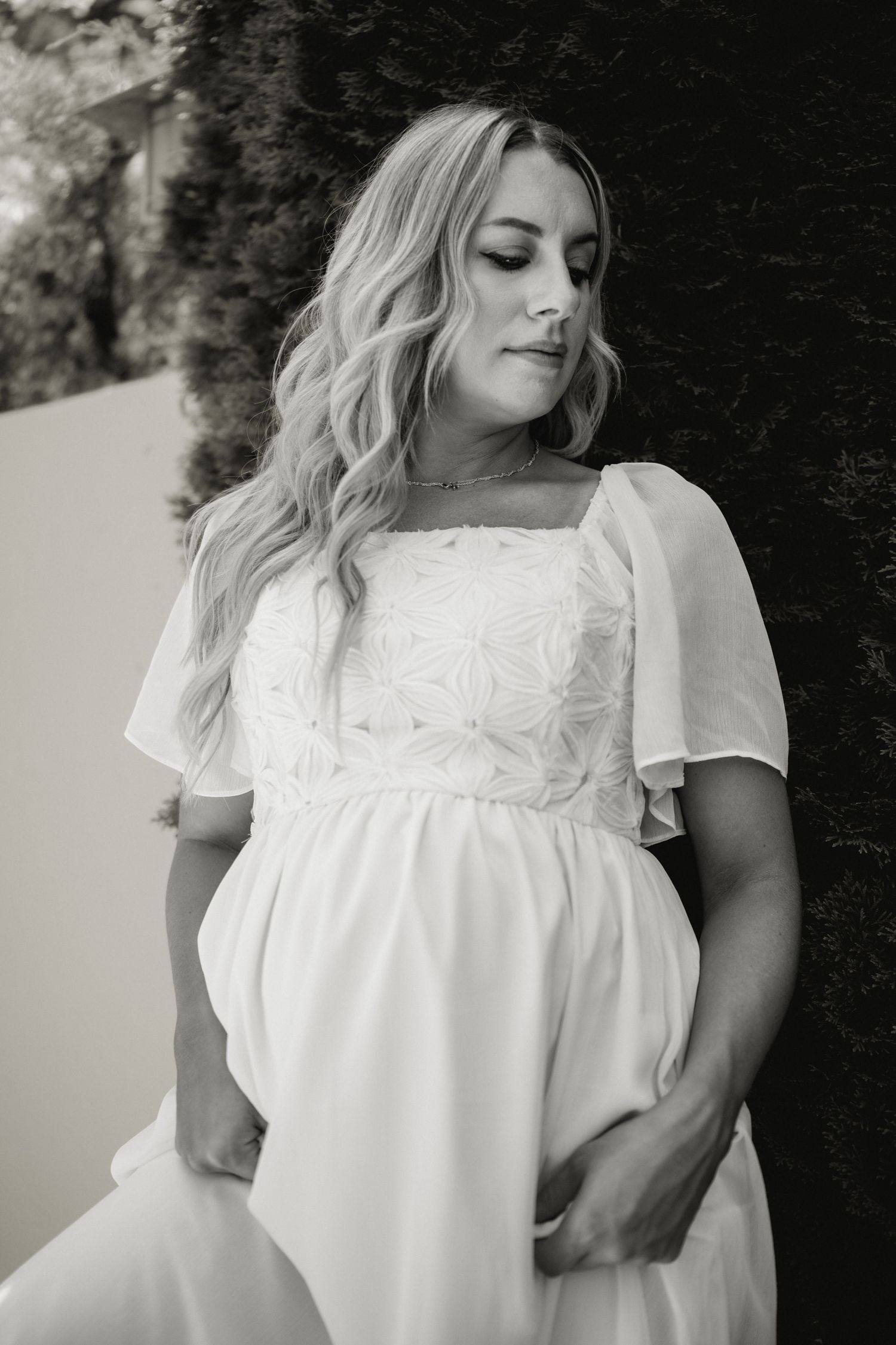 Ethereal portrait in white lace dress against dark background. Schedel Gardens, Elmore, Ohio