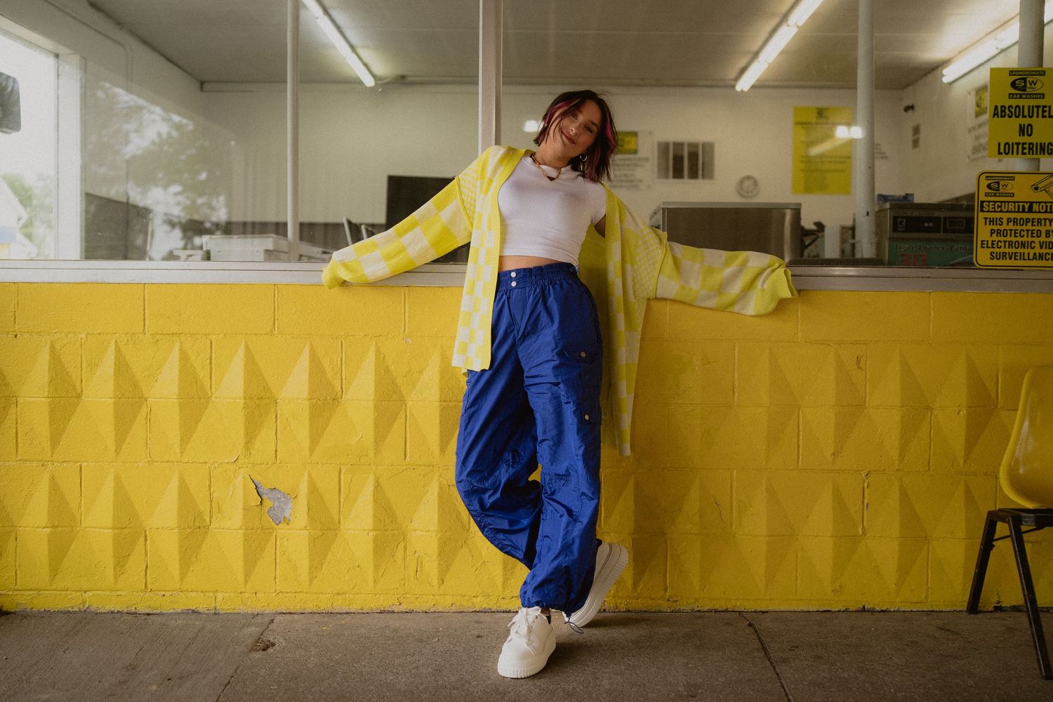 Dance-inspired photoshoot in an industrial space with yellow walls.  Clyde, Ohio