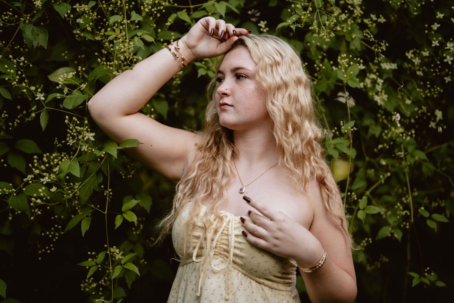 Artistic portrait series in a garden setting with dramatic lighting and green foliage. Steyer Nature Preserve Tiffin, Oh