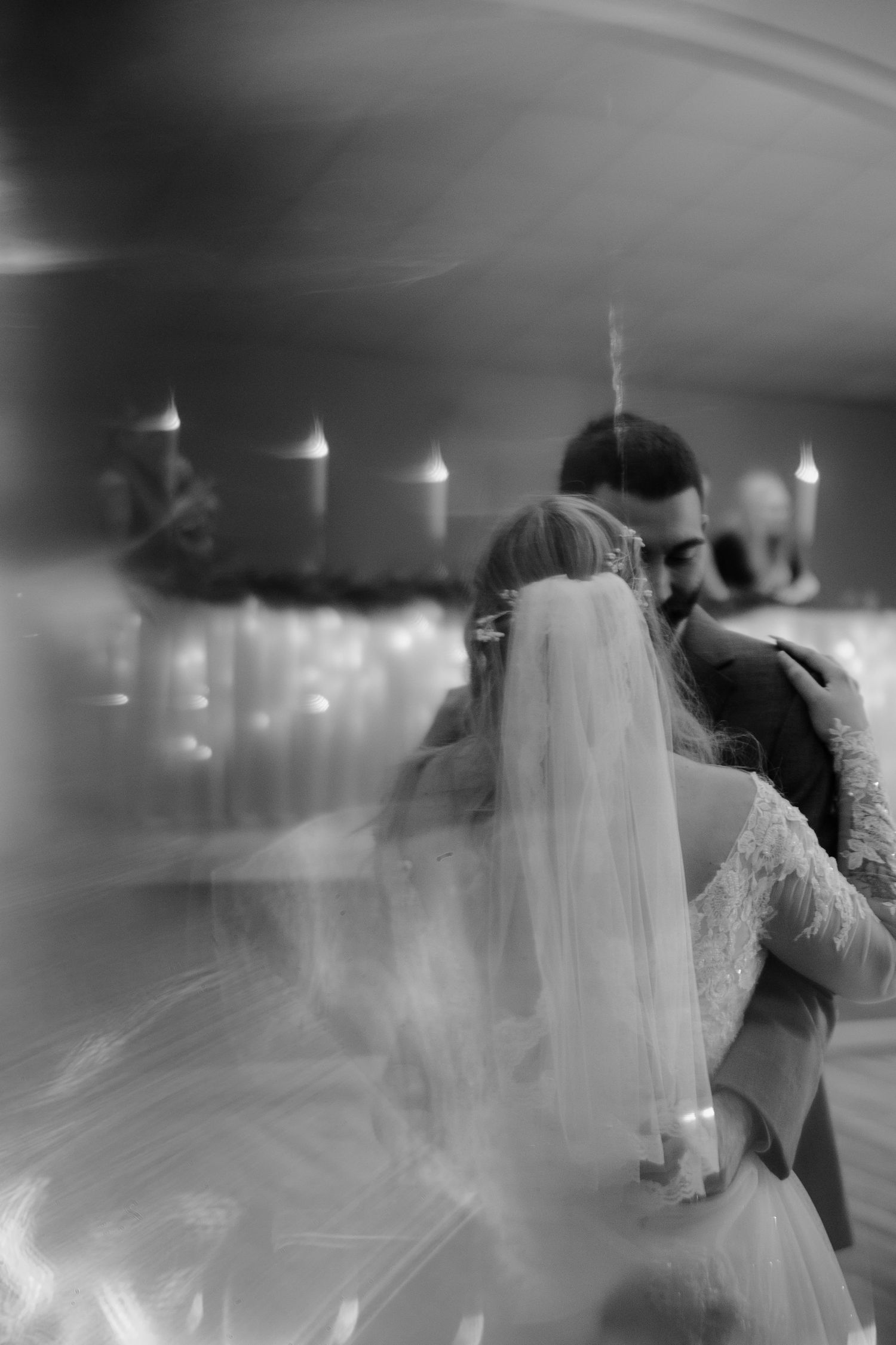 Ethereal dance floor scene with flowing veil movement in black and white.  Rising Sun Ohio