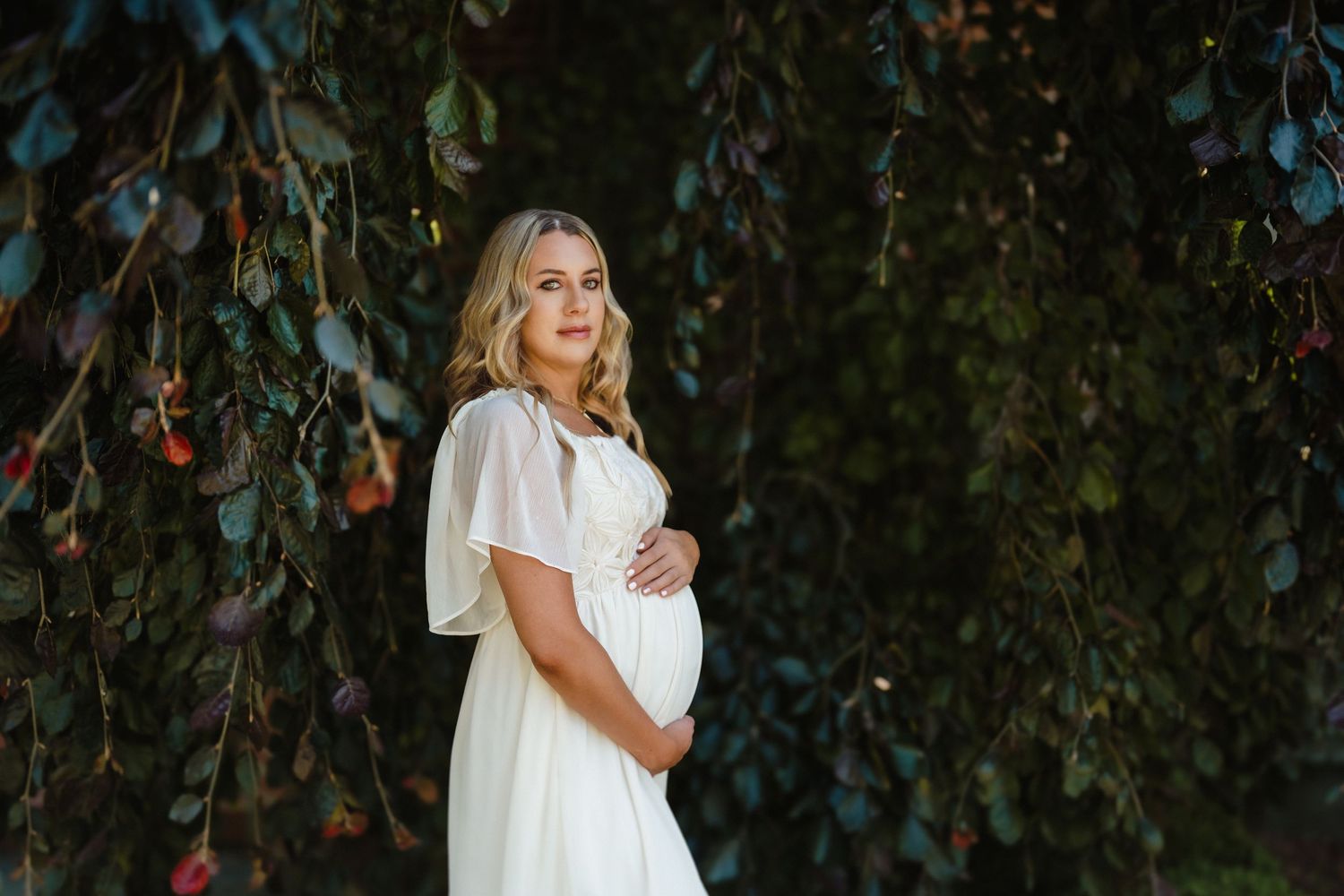 Intimate lifestyle portraits against dark foliage background. Schedel Gardens, Elmore, Ohio