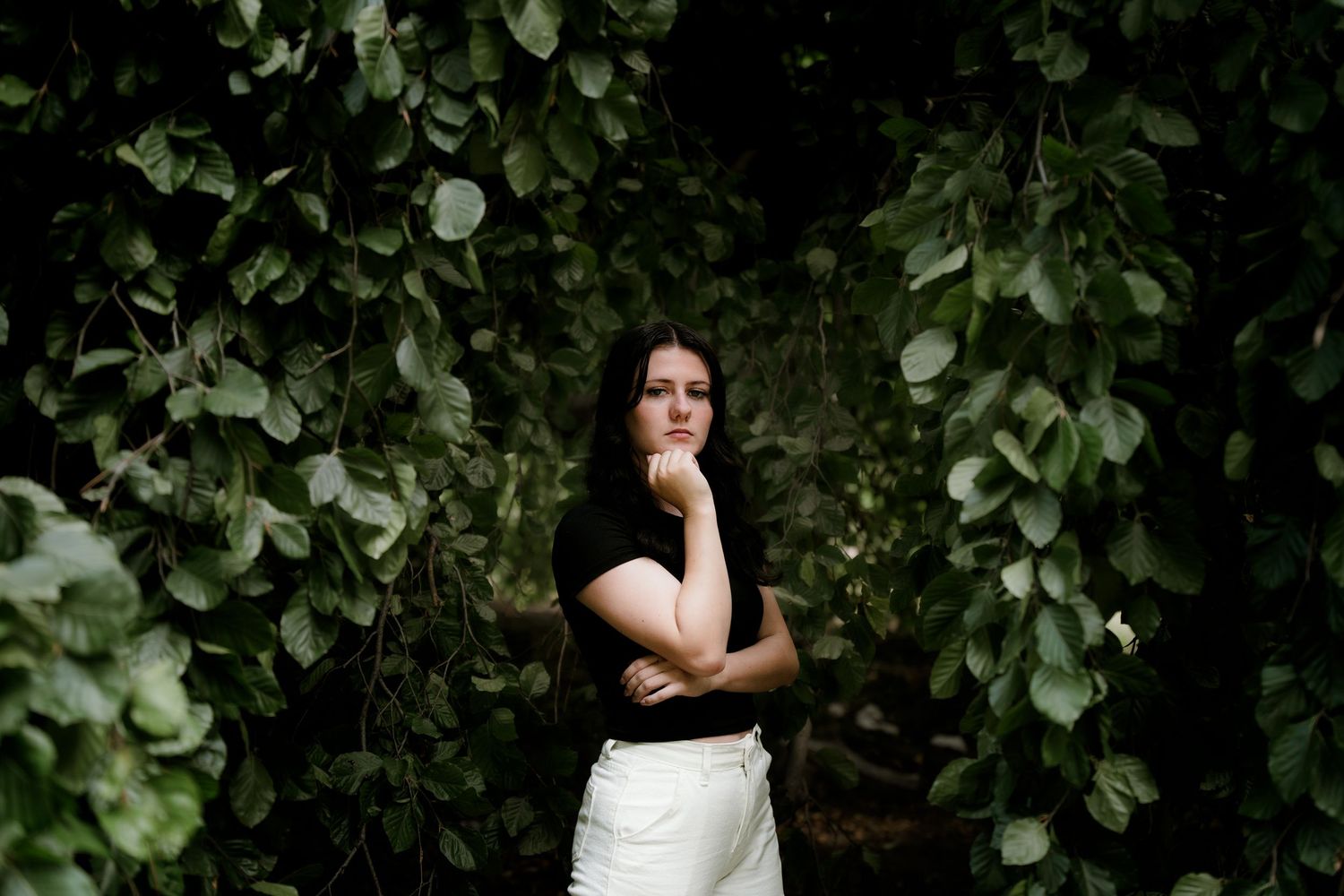 Artistic portrait among lush green foliage and leaves. Sandusky Ohio