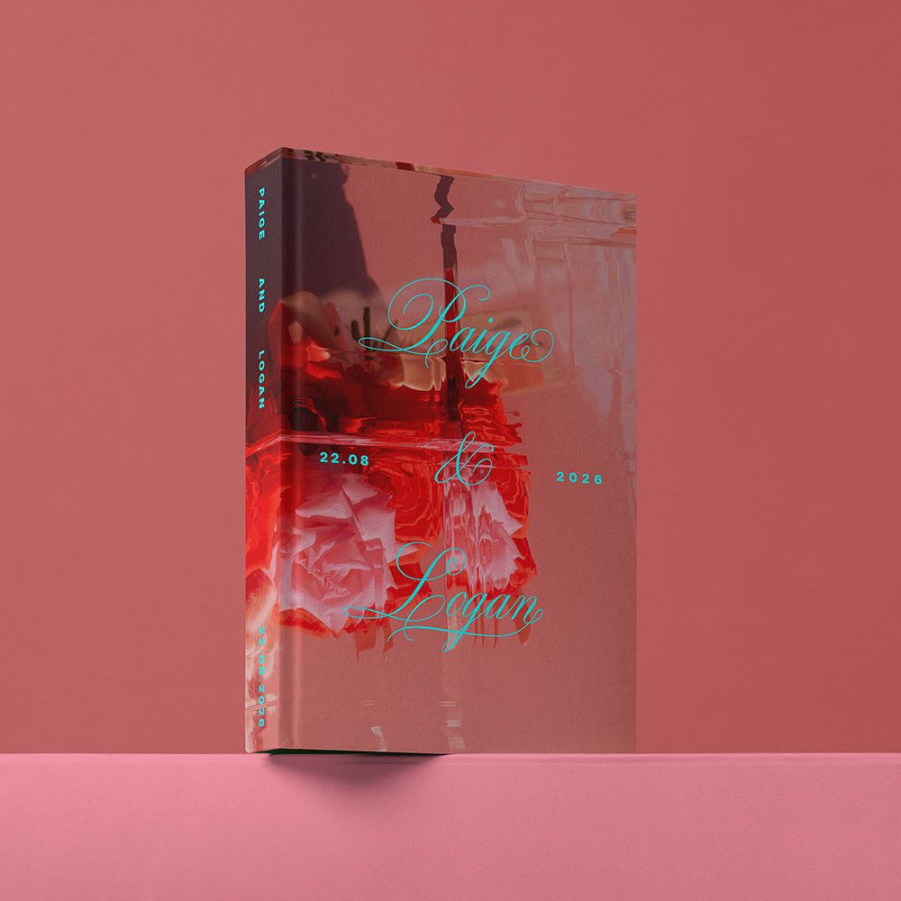 Elegant wedding invitation box with red roses and cursive text on a pink background, dated 22.09.2025.