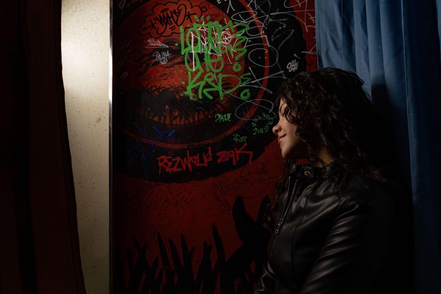 Dark atmospheric portrait sequence with dramatic red lighting against a black background.