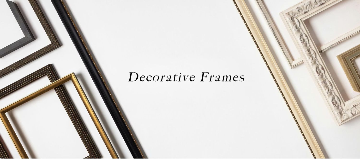 Elegant white and gold decorative picture frames arranged in a minimalist pattern against a white background.