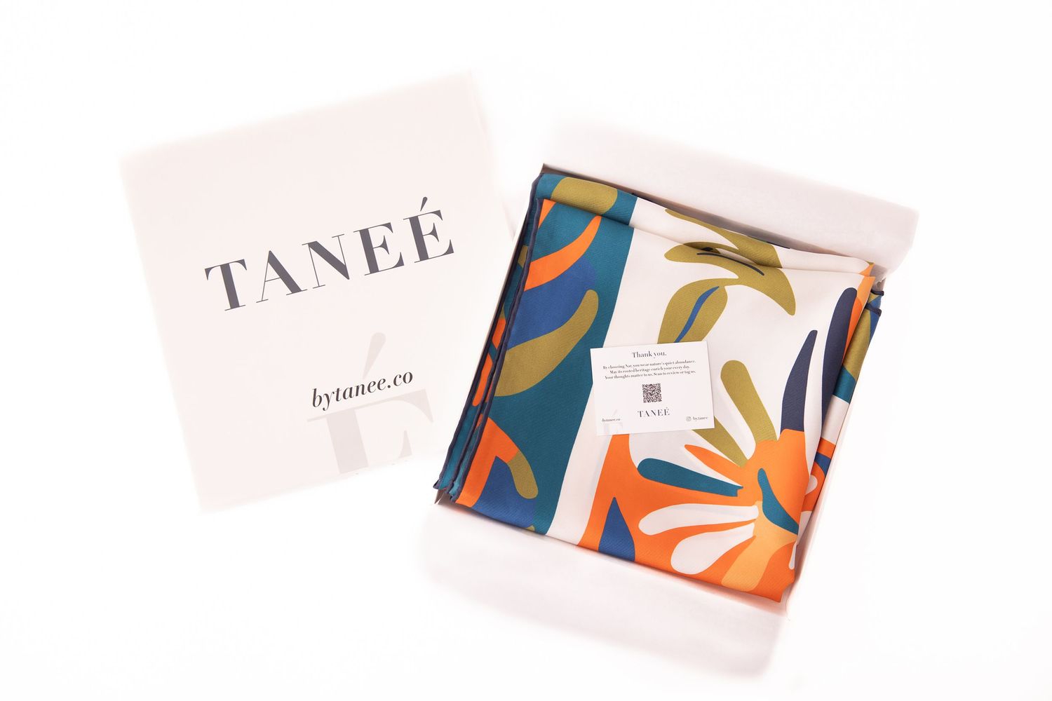 Modern abstract business cards with organic shapes in blue, orange and white arranged in a floating layout.